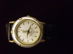 Watch with leather strap $130.00